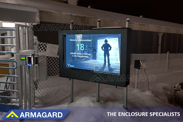 55" landscape outdoor digital signage enclosure installed beside a ski-lift