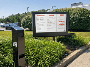 Armagard outdoor tv enclosure mounted on a patio wall